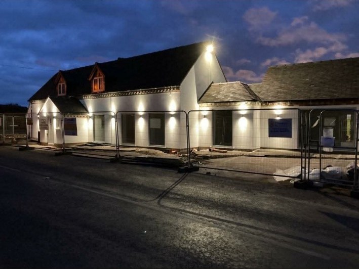 Commercial building exterior lighting at night